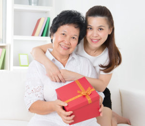 happy grandma and her caregiver